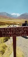 Guided trekking group visiting the Pastoruri Glacier in the Cordillera Blanca near Huaraz, showcasing the high-altitude Andean landscape at 5,000 meters.