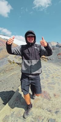 tourist-smiling-pastoruri-glacier-huaraz-trek
